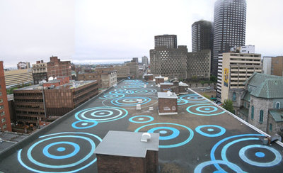 “Monumental rooftop artwork on the Belgo building that draws attention to the enormous surface and untapped potential which the city’s...